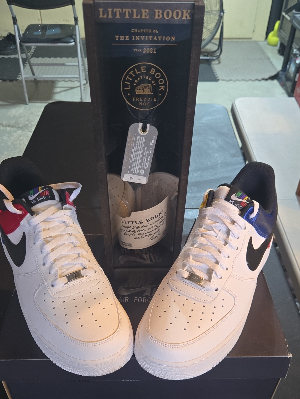 Nike White Low-Top Sneakers with Black Swoosh and Multicolor Accents